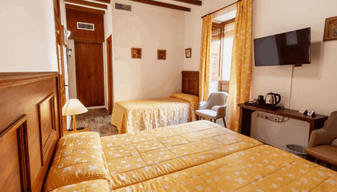 Dormitorio acogedor en hostal céntrico de Dénia