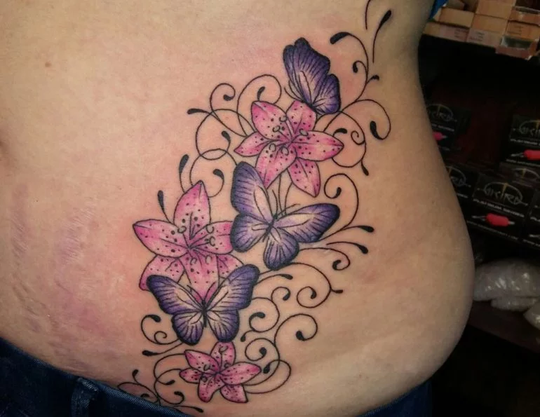 Tatuajes en Dénia - As Meigas Tattoo & Piercing - mariposas costado