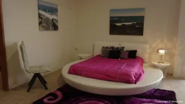 dormitorio-redondo-muebles-martínez