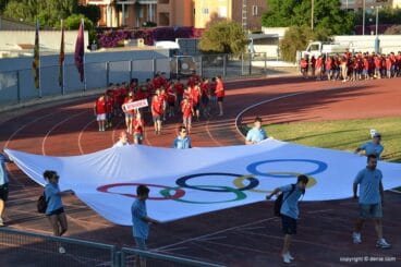 Desfile bandera olímpica