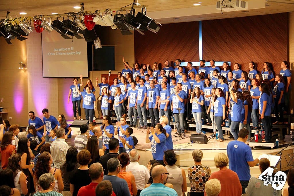 Público y coro en el concierto de clausura