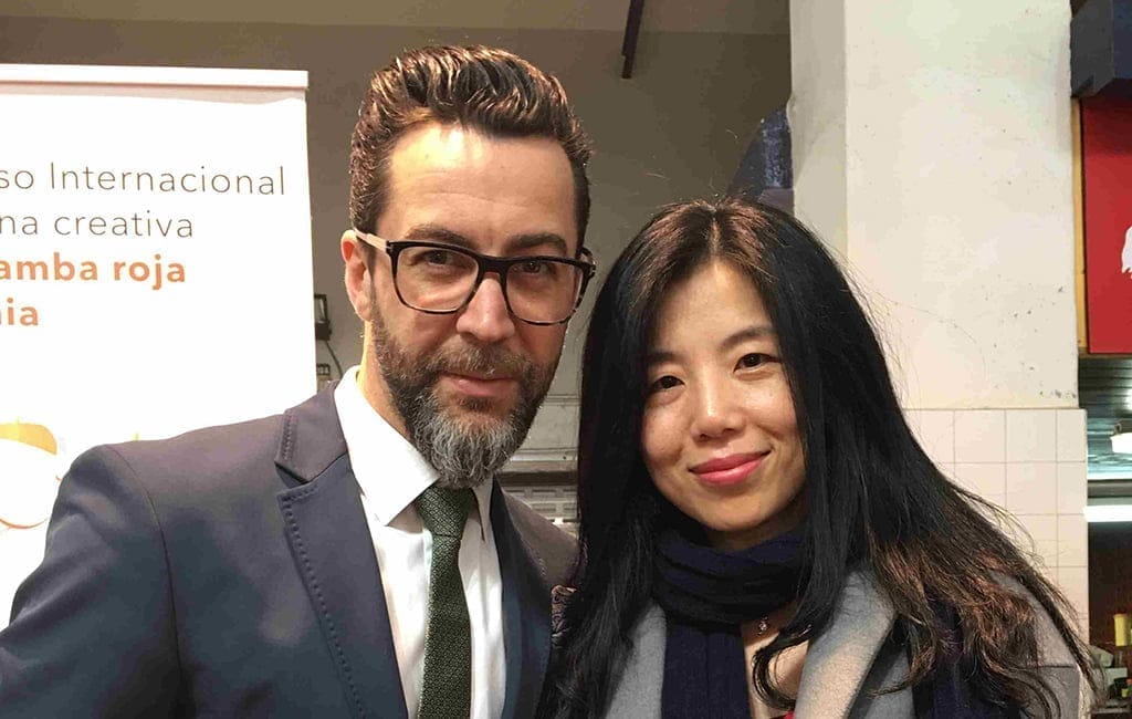 Fang Li junto a Quique Dacosta en el concurso de la gamba roja