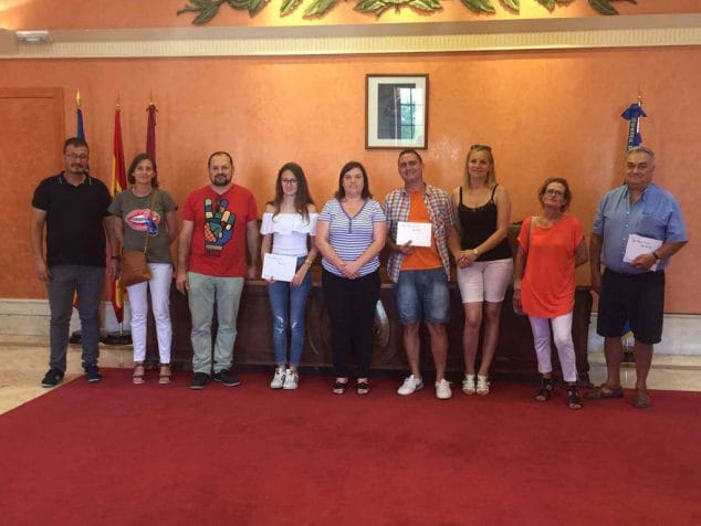 ganadores con sus familias
