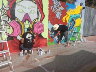 Die Graffiti-Künstler bei der Arbeit