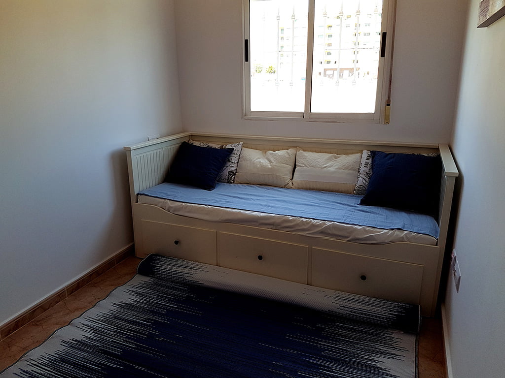 Dormitorio con cama individual Inmobiliaria Adal