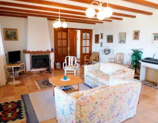 salon con chimenea catorce soluciones inmobiliarias