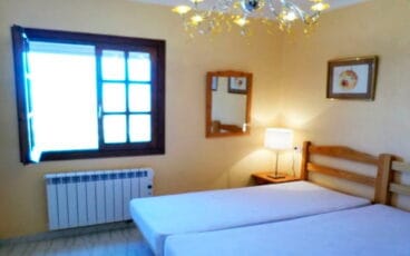 Dormitorio de la villa Catorce Soluciones Inmobilairias