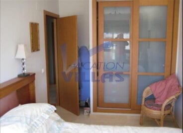 Dormitorio de la casa Vacation Villas