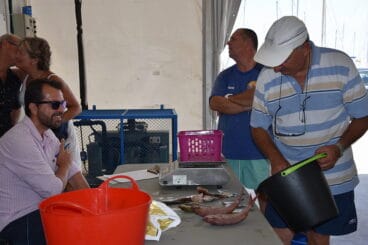 Acto de pesaje de especies