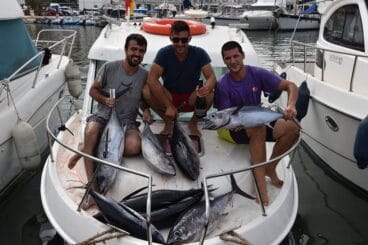 Sonrientes con las capturas logradas