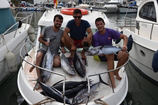 sonrientes con las capturas logradas