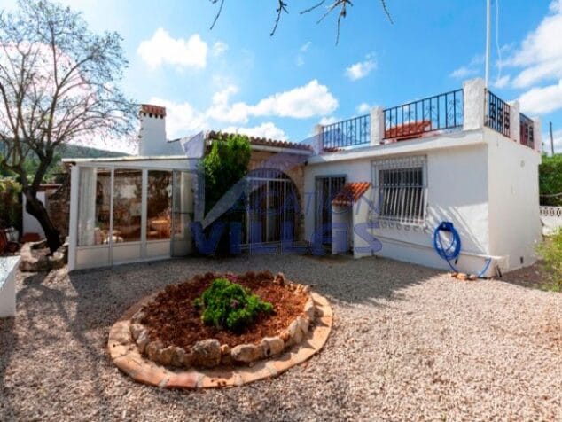 jardin con grava vacation villas