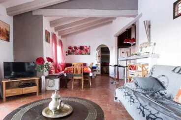 Sala de estar y comedor Quality Rent a Villa