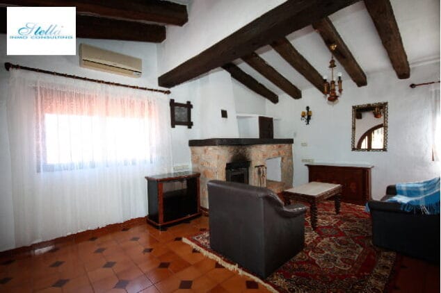 sala de estar con chimenea stella inmo consulting