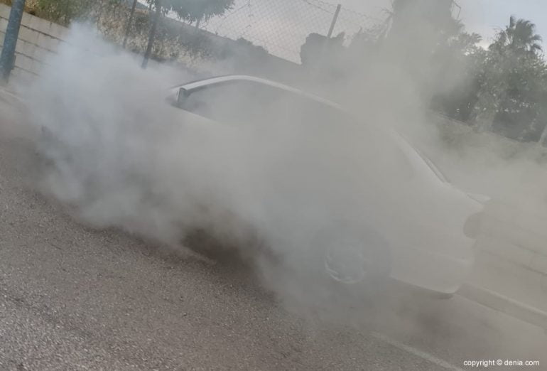 A vehicle burns on a street in Denia