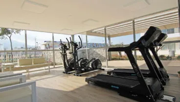 Gimnasio en las zonas comunes de un apartamento para vacaciones en Dénia – Quality Rent A Villa