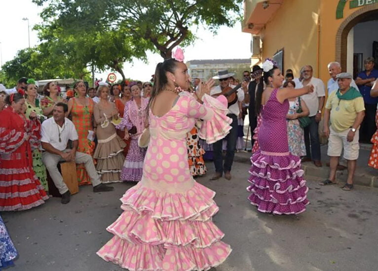 Attendees to the Romería del Rocío dancing
