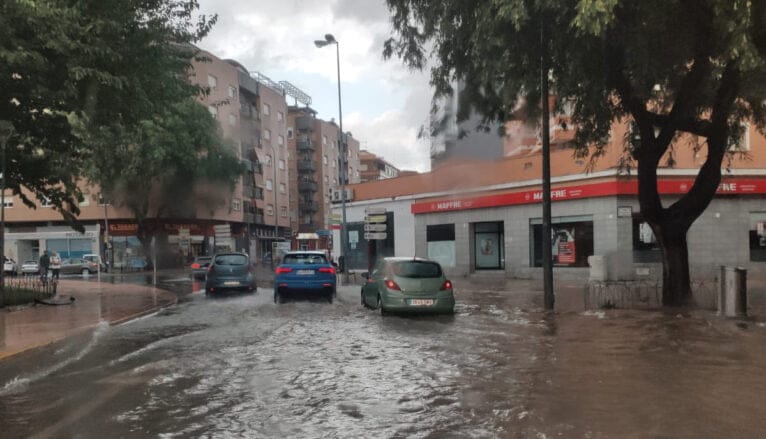 Calle anegada por las lluvias del pasado agosto copia