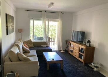 Salón acogedor del adosado en San Nicolás de Inmoden Inmobiliaria