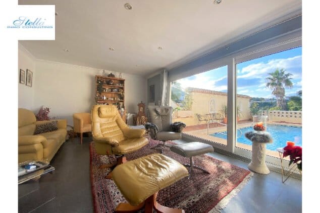 Enamórate de esta preciosa villa en Dénia con espectaculares vistas al mar 6 villa con amplio salon con salida a la piscina stella inmo consulting