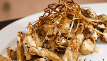 Raciones de alcachofas fritas con Manduc