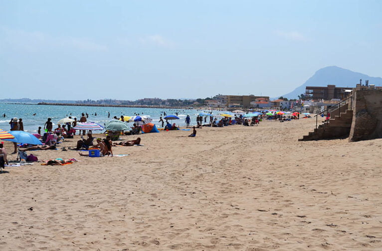The Montgó, in the background, from Les Deveses beach in Dénia