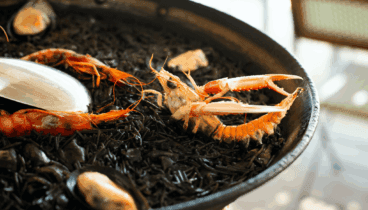 Comer paella en Dénia -Cova del Mero