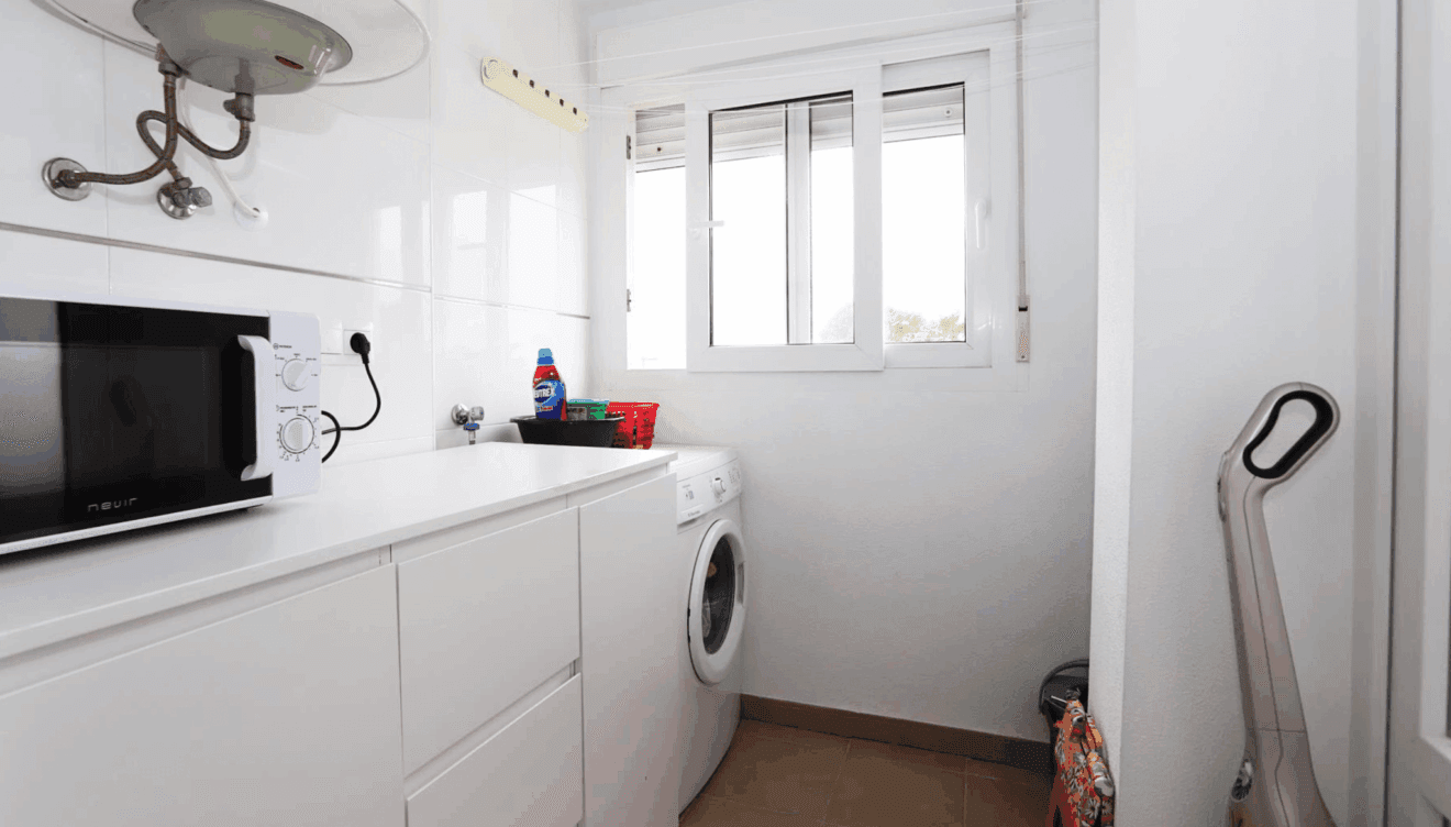 Galería acristalada junto a la cocina