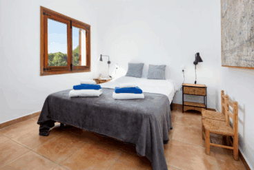 Dormitorio doble de estilo rústico