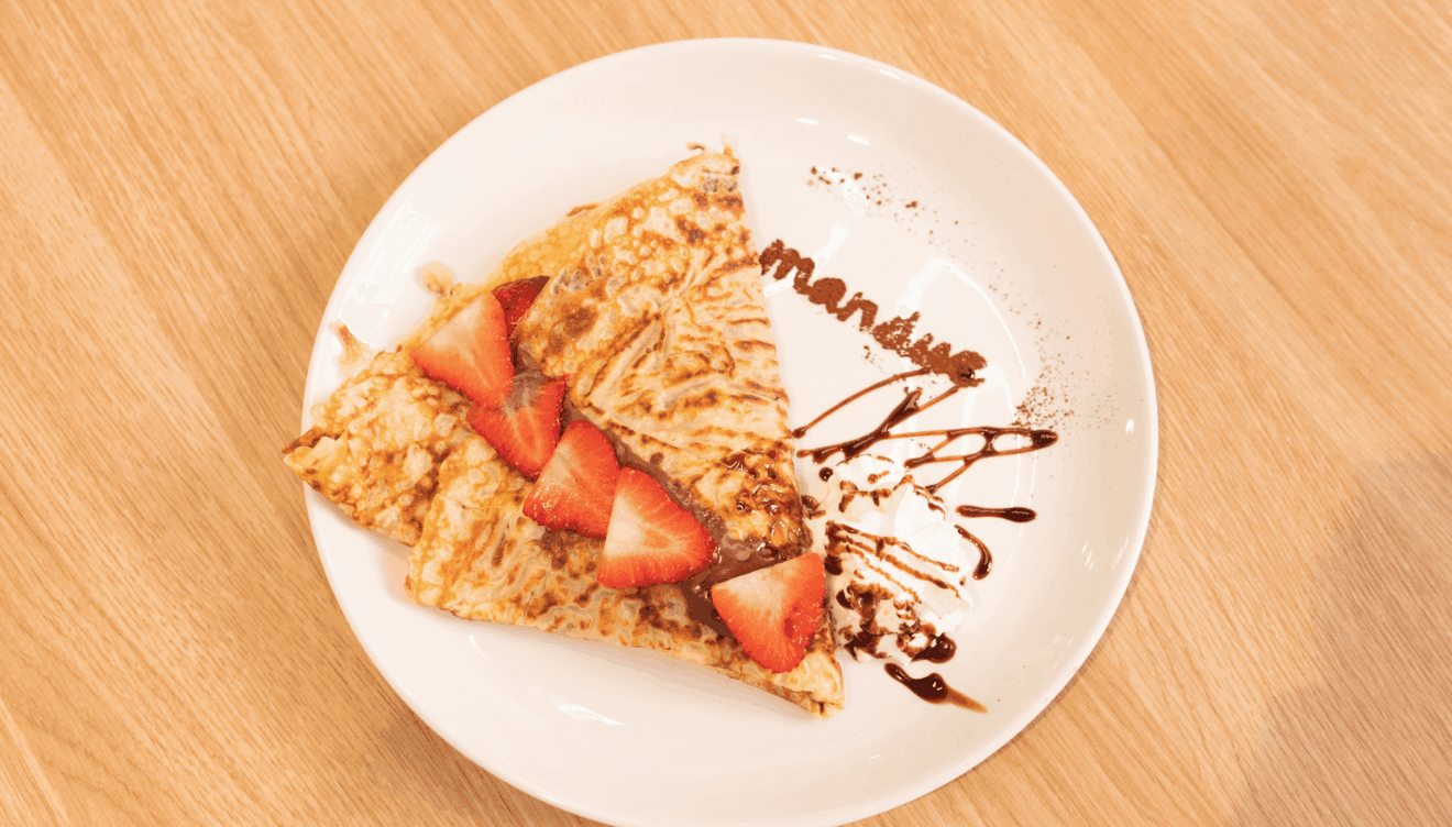 Comer crepes de chocolate en Portal de la Marina