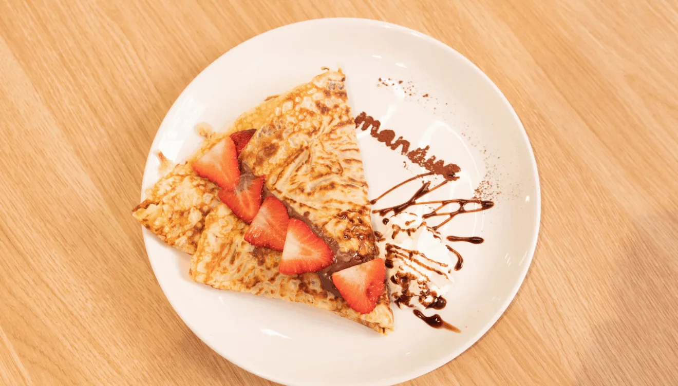 Comer crepes de chocolate en Portal de la Marina