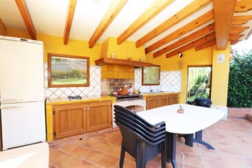 Zona de cocina exterior cubierta