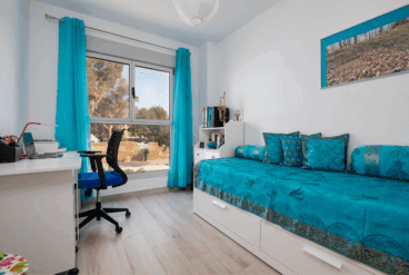 Dormitorio individual con cama nido