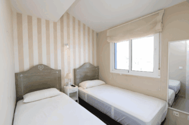 Dormitorio con dos camas