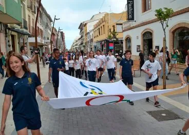 Bandera Olímpica y la antorcha del Mini Jocs en Dénia en 2019