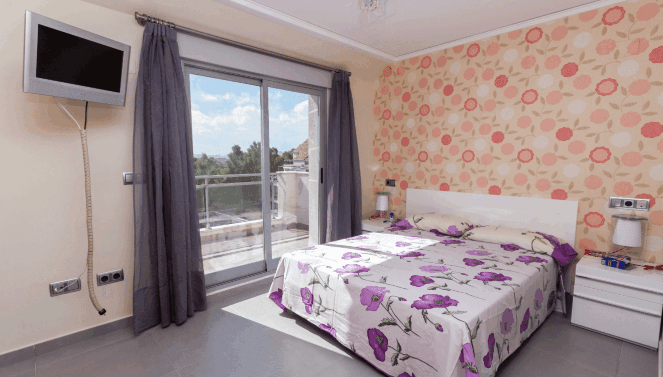 Habitación de la planta superior con terraza