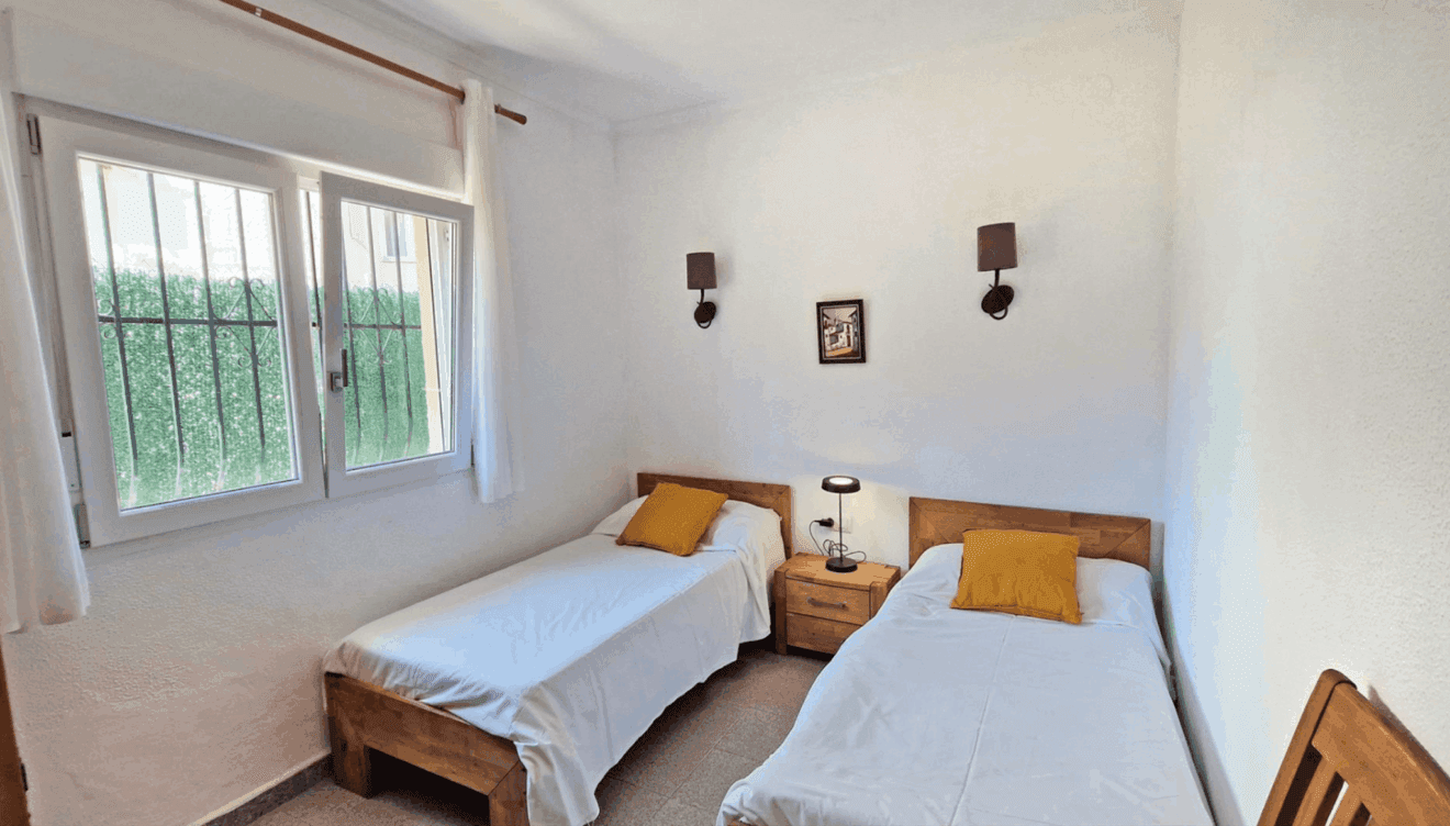 Habitación con doble cama individual