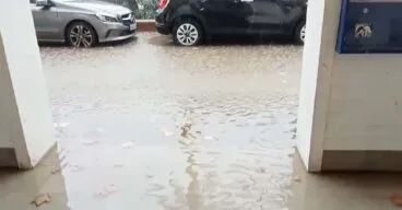 calle de denia anegada por la lluvia