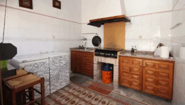 Cocina exterior con barbacoa