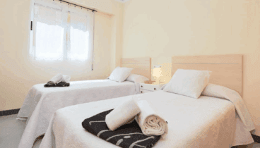 Habitación con dos camas individuales para los más pequeños