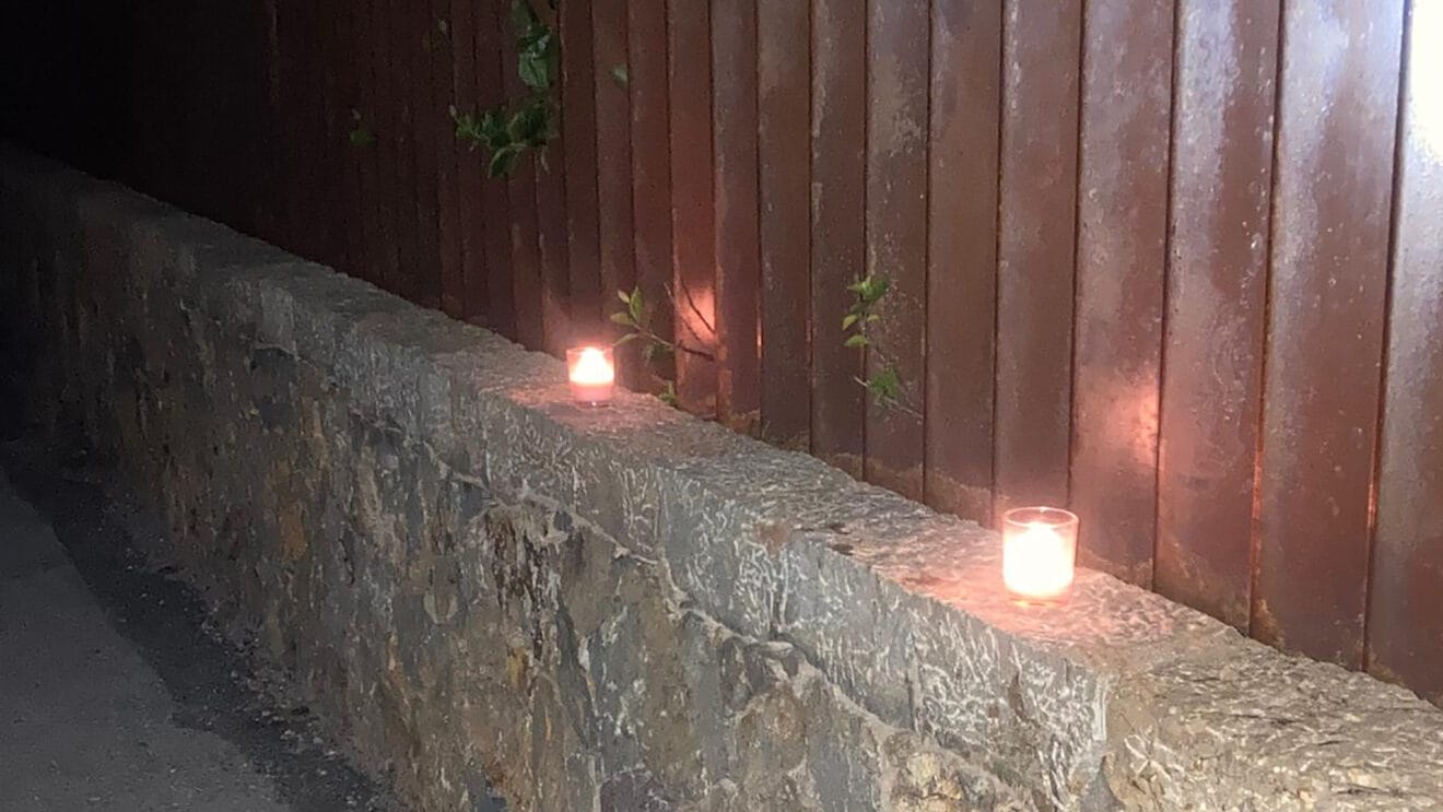 Muro a dos velas. Gent de Dénia.