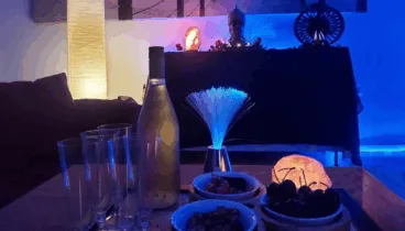 Masaje en pareja con copa de cava