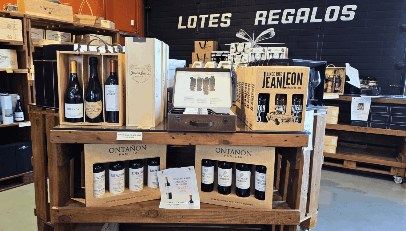 Un detalle único_ vinos, embutidos y conservas de calidad en una presentación elegante
