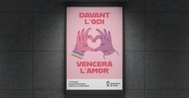 cartel de la campana de denia contra la lgtbi fobia en un mupi simulado
