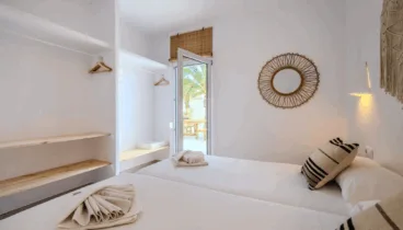 Dormitorio doble con mobiliario funcional