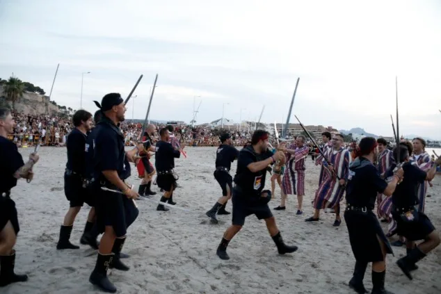 Dénia firma la tregua a orillas del mar: las tropas moras conquistan la escollera norte antes del gran choque 76 desembarco moro de denia de 2026 73